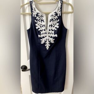Lilly Pulitzer Mid length form fitting dress.